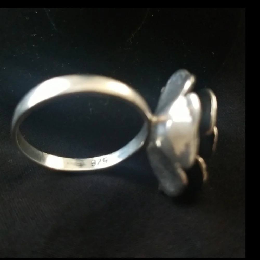 Sterling silver rose ring.